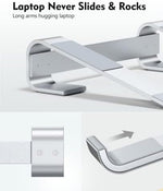 Ergonomic silver desk stand elevating a sixteen inch modern notebook
