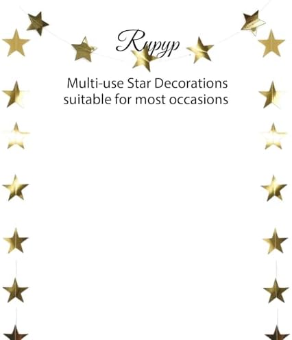 Starry night themed birthday party wall decorated with shimmering gold streamers