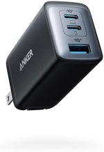 Anker multi device compact foldable adapter showing the dual USB-C ports and single USB-A port interface close up.