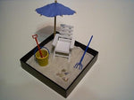 Full packaging view of the imported My Little Sandbox Beach Break stress relieving office toy showing all ten accessories.
