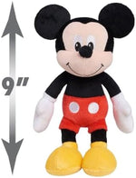 Disney Junior Mickey Mouse plush sitting upright on a display surface