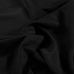 Close up look at the durable stitching and hem of the black flat sheet