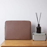Comfyable minimalist lifestyle tablet sleeve side profile illustrating the slim and sleek travel design