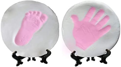 Novarena personalized baby footprint keepsake displayed as nursery wall decor with ribbon.