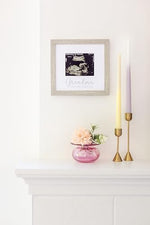 Kate & Milo gender neutral baby keepsake frame in a modern nursery setting