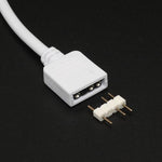 White addressable RGB LED sync cable demonstrating the flexible soft PVC shell and internal copper wire layout.
