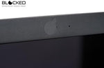 Water resistant vinyl camera covers being removed using tabbed edge