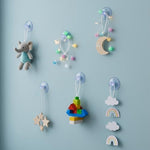 Multi purpose clear suction cups being used for home cable management.