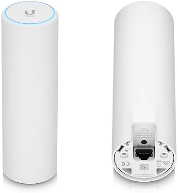 Ubiquiti Networks dual band wireless mesh access point retail box and included mounting hardware.