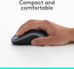 Logitech M185 swift grey mouse being used comfortably with a modern laptop computer.