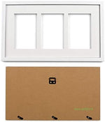 Elegant white nursery wall decor featuring the hand-finished baby milestone frame with a dog paw print.
