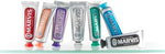 Authentic imported Marvis premium toothpaste tube displayed on a clean bathroom countertop