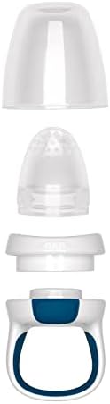 Parent inserting food into OXO Tot silicone replacement pouch