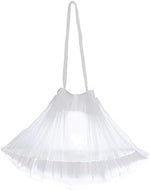Tebery disposable baby toilet seat bags being fitted over a standard white toddler training chair