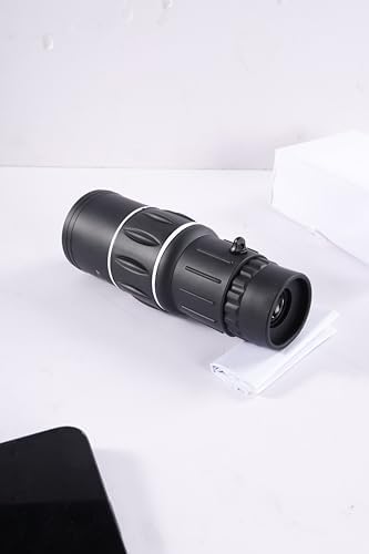 TSQQST tactical handheld monocular telescope with attached wrist strap and protective lens caps.