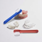WZNTPJS premium adult toothbrush for dentures detailing the large tufted surface cleaning head