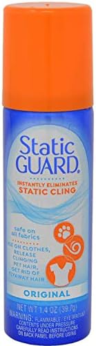 Static Guard aerosol spray being used to prevent clothes from sticking.