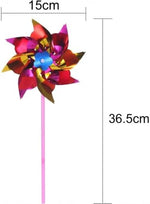 Close up of vibrant rainbow pinwheel blades