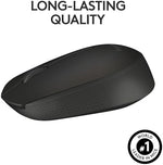 Logitech M170 computer peripheral resting on a desk surface near a modern slim laptop
