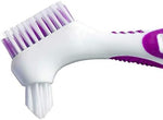 Water resistant nylon bristles of the premium denture care brush demonstrating elasticity under running water.