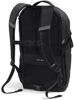 The North Face Recon water-repellent backpack side view showing the dual mesh water bottle pockets and compression straps
