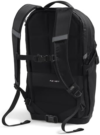 The North Face Recon water-repellent backpack side view showing the dual mesh water bottle pockets and compression straps