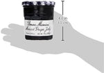 Gourmet Muscat grape jelly jar paired with fine cheeses on a serving platter