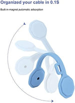 Reusable magnetic cord holder clipping a phone charging wire neatly.