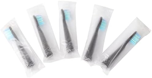 Black electric toothbrush refills with blue and white W-shaped bristles