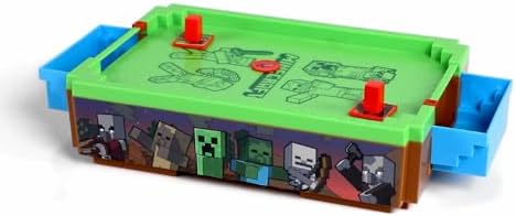 Underneath view of the tabletop air hockey unit illustrating the battery compartment switch