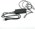 Dell compact laptop charger accessory laid flat on white background