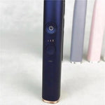 Durable electric toothbrush host piece standing upright on a clean surface