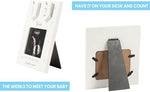 Angled view of the Boom Moments baby countdown frame showing the sturdy tabletop easel stand.