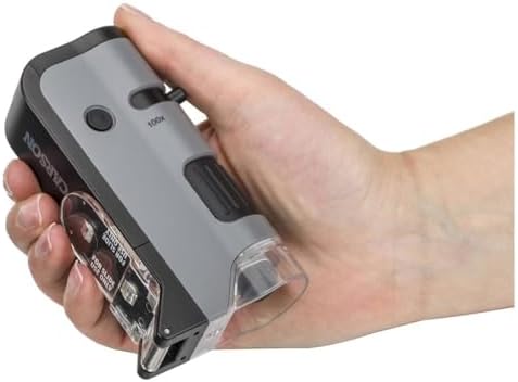 Carson UV pocket microscope detecting fluorescing materials in dark conditions