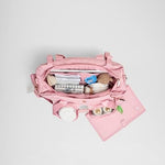 Close up of gold-tone hardware on Huggies Signature Hug Tote