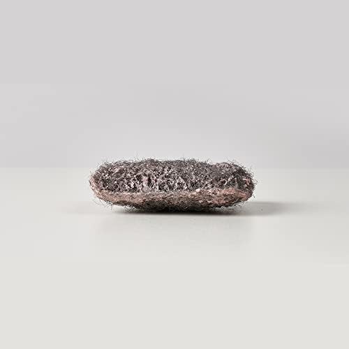 Close up of Brillo steel wool texture with built-in red soap