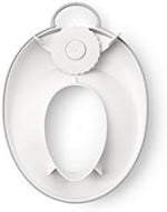 BabyBjorn Toilet Trainer White Gray splashguard close up and non slip rubber edging view