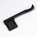 Side perspective of the lightweight black camera handgrip showing clear clearance for top controls.