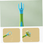 Blue and green bendable toddler cutlery showing the 360 degree flexible design