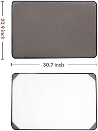 Side profile of the slim Tektalk gray puzzle mat stored safely flat under a living room couch
