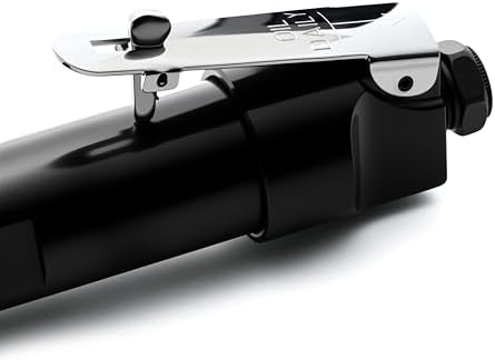 Hand holding Adium needle scaler showing ergonomic grip