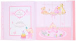Christian Art Gifts pink keepsake photo album closed with its solid pink magnetic flap closure