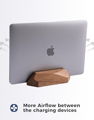 Nuvograin vertical wood stand holding a Microsoft Surface Pro laptop to save desk space.