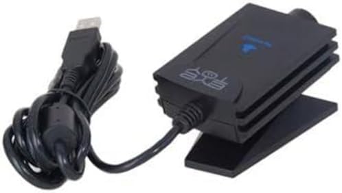 Retro PlayStation 2 gaming camera accessory setup view on a flat surface