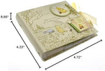 Disney Magical Beginnings baby photo album being held to showcase its actual size.