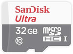 Close-up of the red and grey SanDisk Ultra 32GB memory card inserted into its standard SD adapter sleeve.
