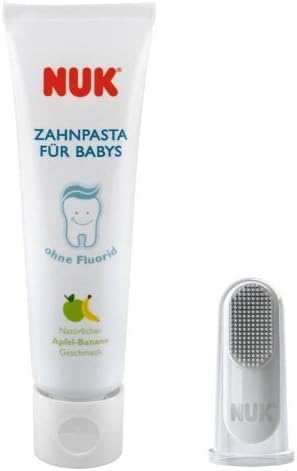 NUK baby fluoride free toothpaste and BPA free silicone finger toothbrush packaging for newborn oral care.