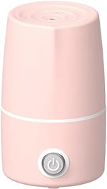 Side profile of Mottery pink sterilizer showing sleek portable design