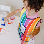 Adjustable neck and waist straps on the Melissa and Doug one size fits all kids apron.