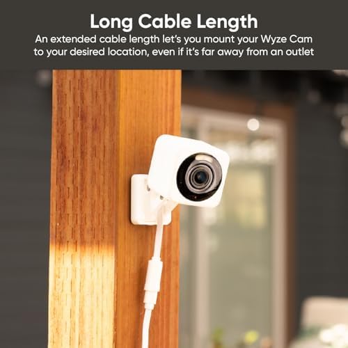 The L-shaped micro USB adapter tip attached to a smart security camera for a low profile installation setup.